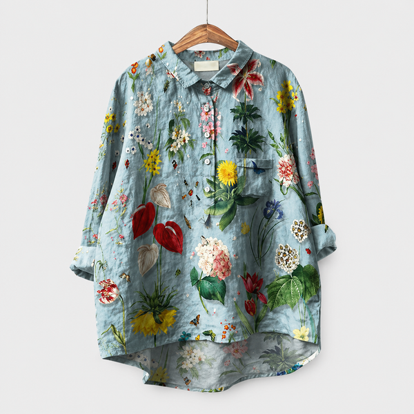 https://cdn.shopify.com/s/files/1/1058/8956/2962/files/Floral_linen_blouse_on_hanger.png?v=1778869842