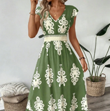 Candela - Vestido maxi barroco con escote en V